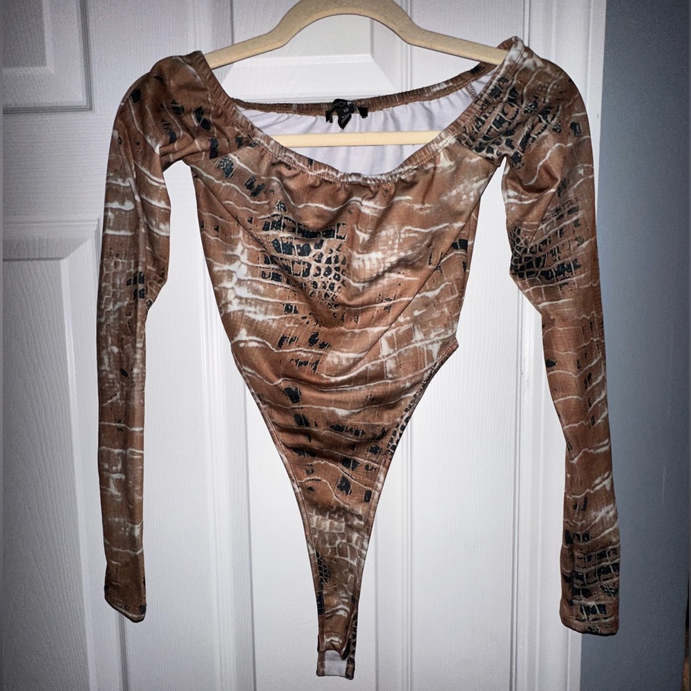 Xs snakeskin body suit. Fashion nova. Never worn